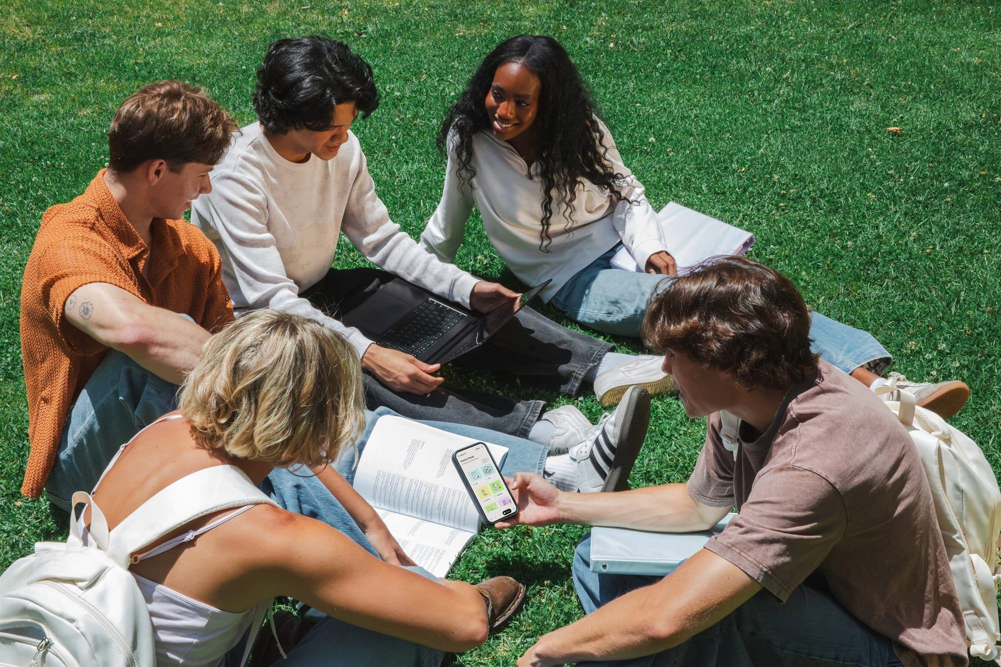 Students studying together outdoors